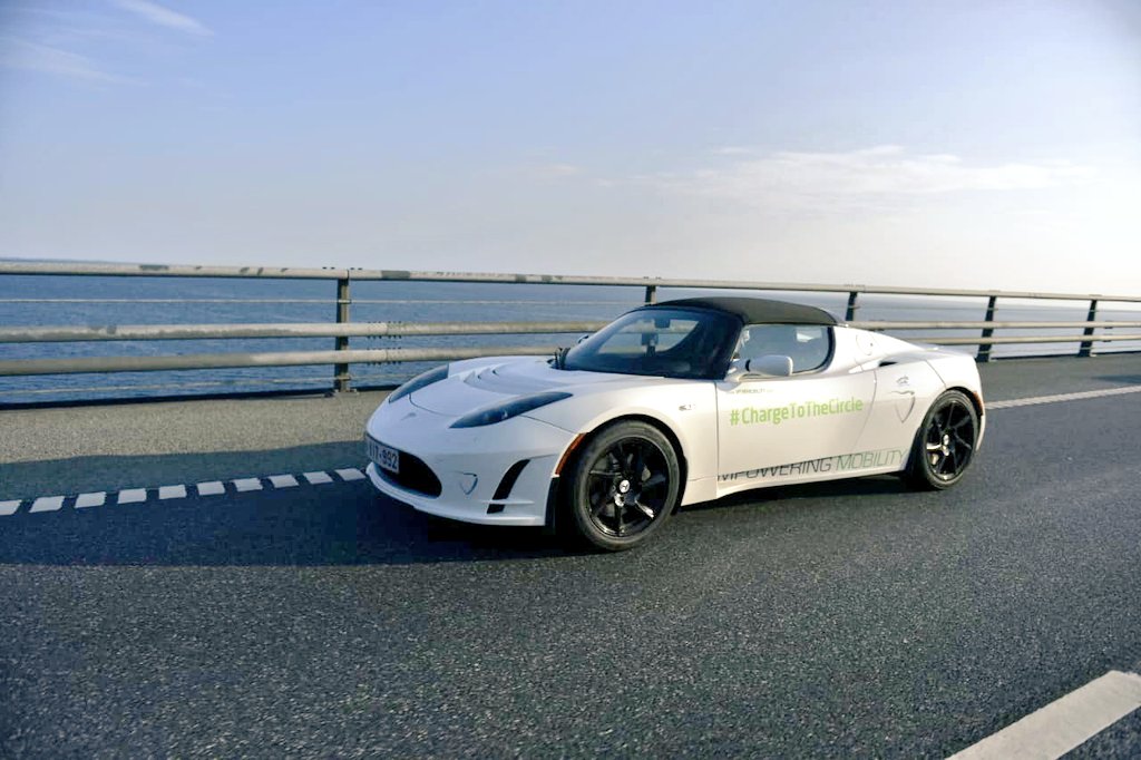 White Tesla Roadster crossing 'The Bridge' between Malmo and Copenhagen